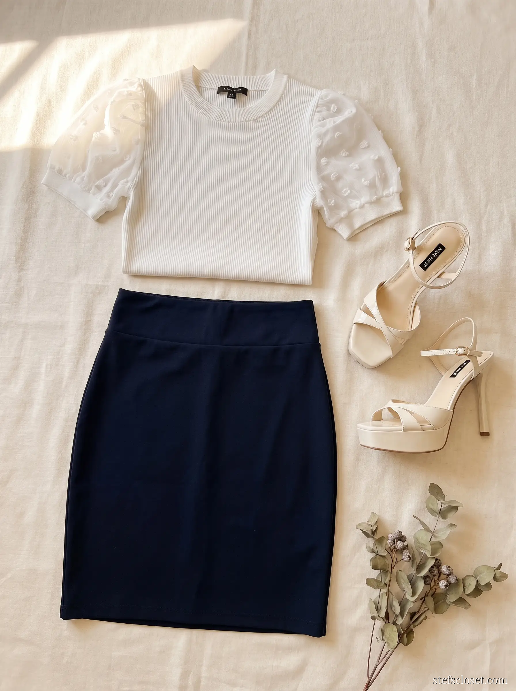 Riviera Ivory — White puff-sleeve top, Navy pencil skirt, Ivory platform sandals